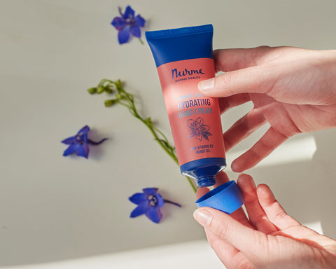 Nurme Sea Buckthorn Vitamin Care Hand Cream with Pro Vitamin B5 and Orange Essential Oil. Hydrating and nourishing formula in vibrant yellow and blue packaging, perfect for soft and healthy hands.